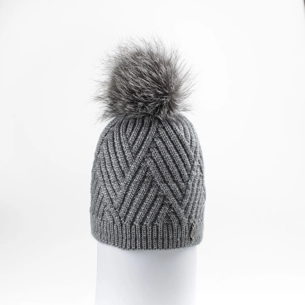 CHEVRON BEANIE WITH UPCYCLED FUR POM